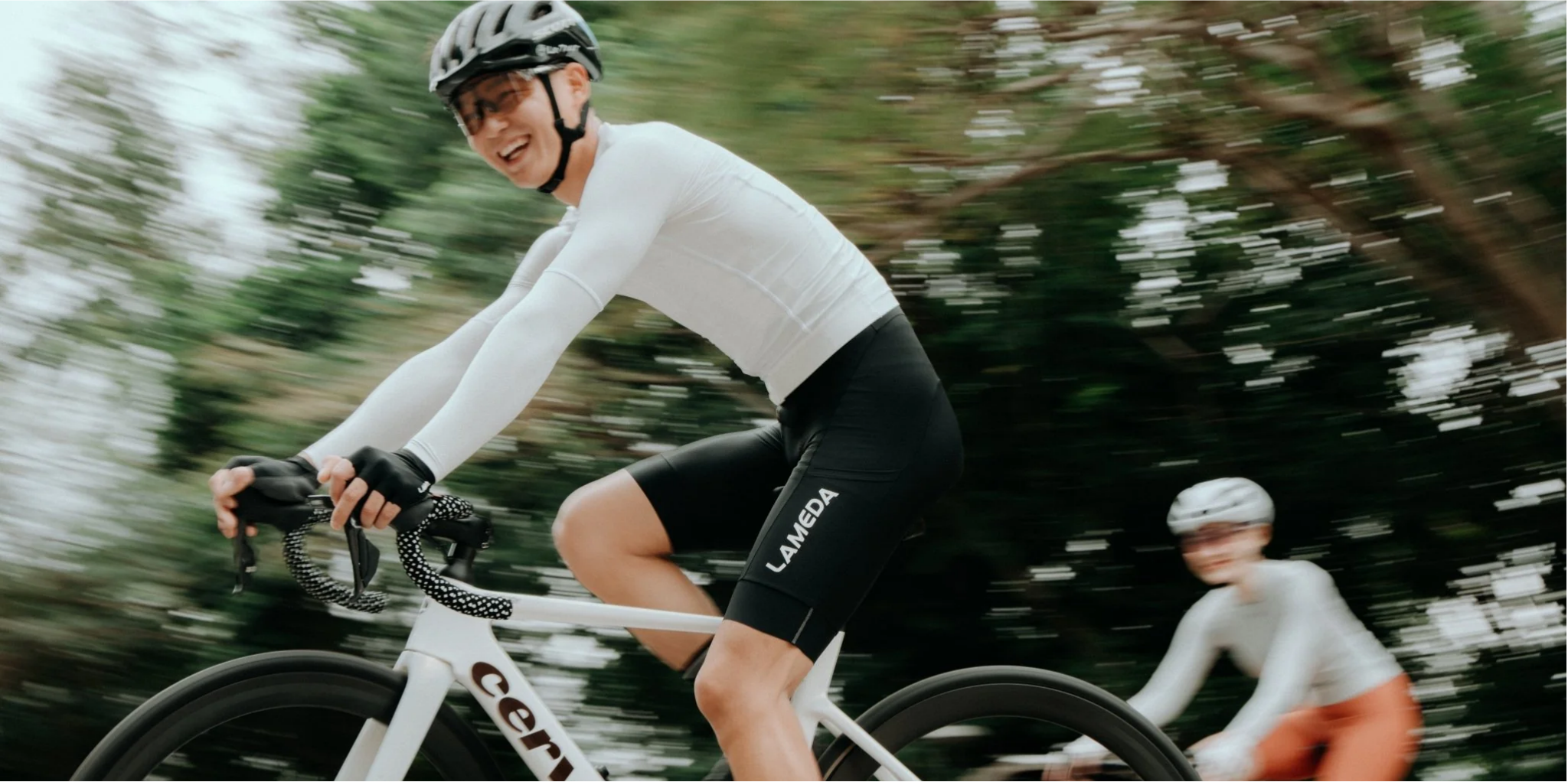 White cervélo road bike with black handlebars and tires illustrating bike fit to prevent nerve compression injuries