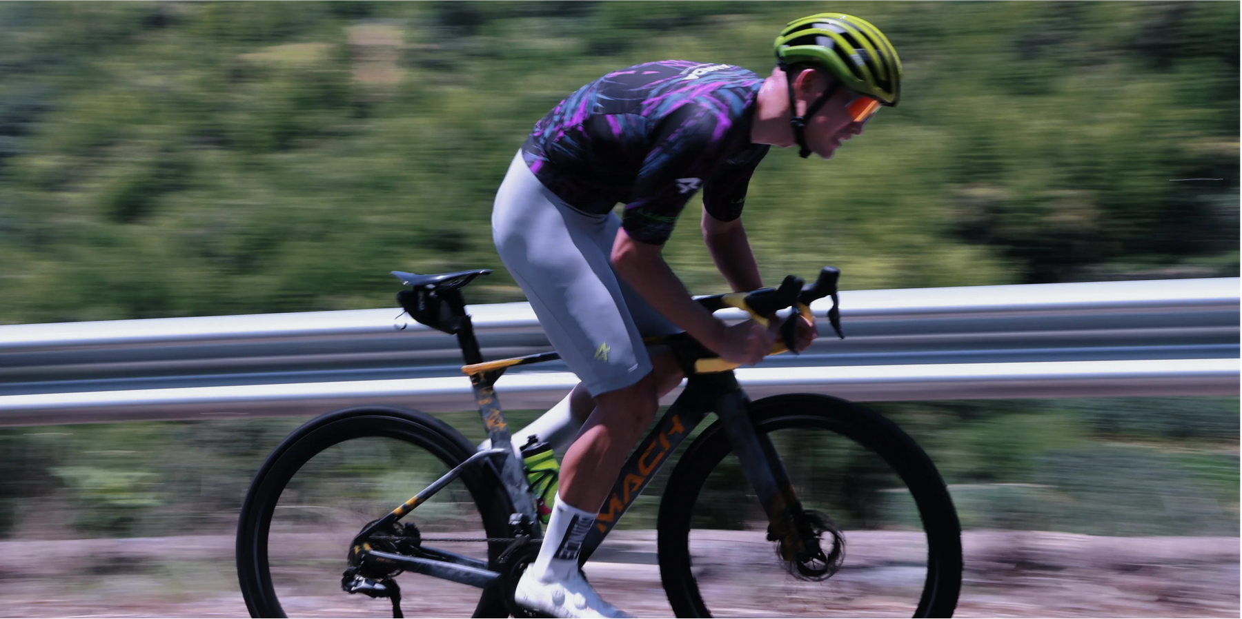 A sleek black and yellow mavic road bike with matte finish illustrating ideal use with cycling bib shorts.
