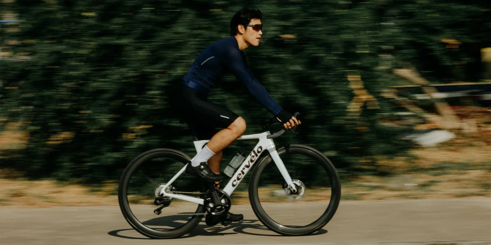 White cervélo road bike with sleek frame and black tires featuring elastic interface pad for enhanced cycling comfort