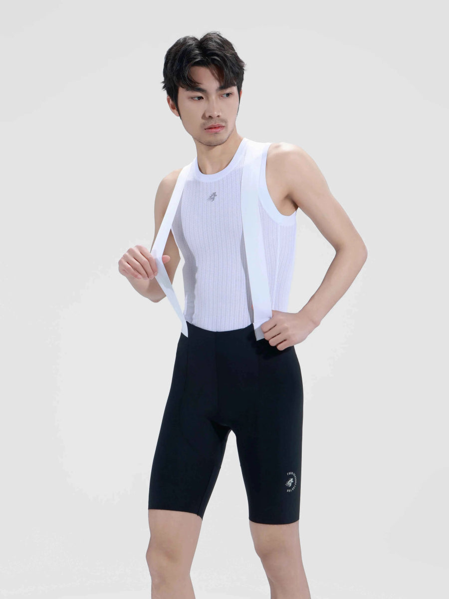 White ribbed cycling jersey paired with lameda dash men cycling bib shorts black featuring adjustable waistband and logo on thigh