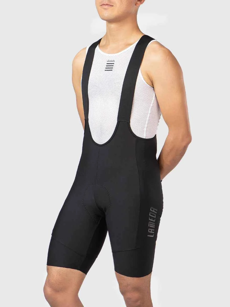 Black dazzling men’s cycling bib shorts with white mesh back panel and lamedia branding ideal for basic men’s cycling