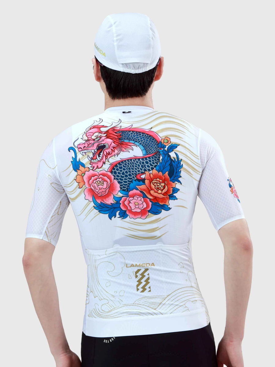 Vit LAMEDA Dragon Soar herr cykeltröja med livligt rosa, blått och guld drakblommönster och logotyp på bröstet