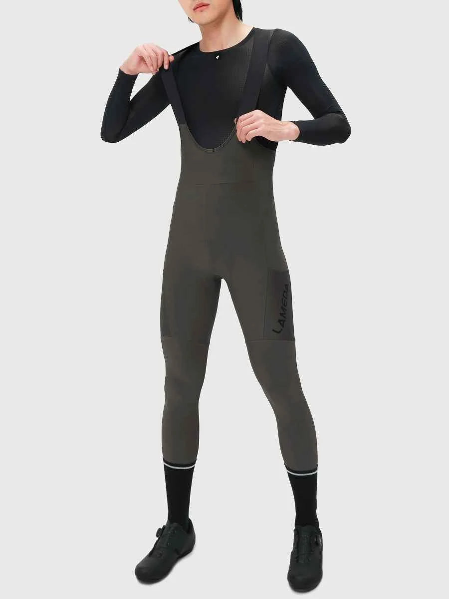 Black thermal fleeced bib tights with integrated jersey and subtle cannondale logo on thigh for cycling use