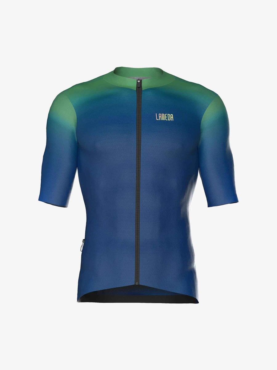 Dusk herrars cykeltrikot i grön till blå gradient med svart blixtlås och reflektiva kanter för förbättrad synlighet