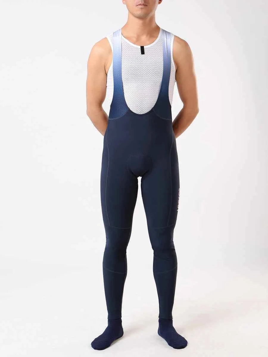 Future men’s thermal fleeced bib tights in navy with white mesh chest panel and gradient shoulder straps for early winter cycling