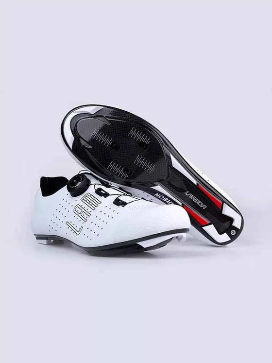 Hank unisex white cycling cleat shoes with black and red accents featuring a sleek carbon fiber sole design