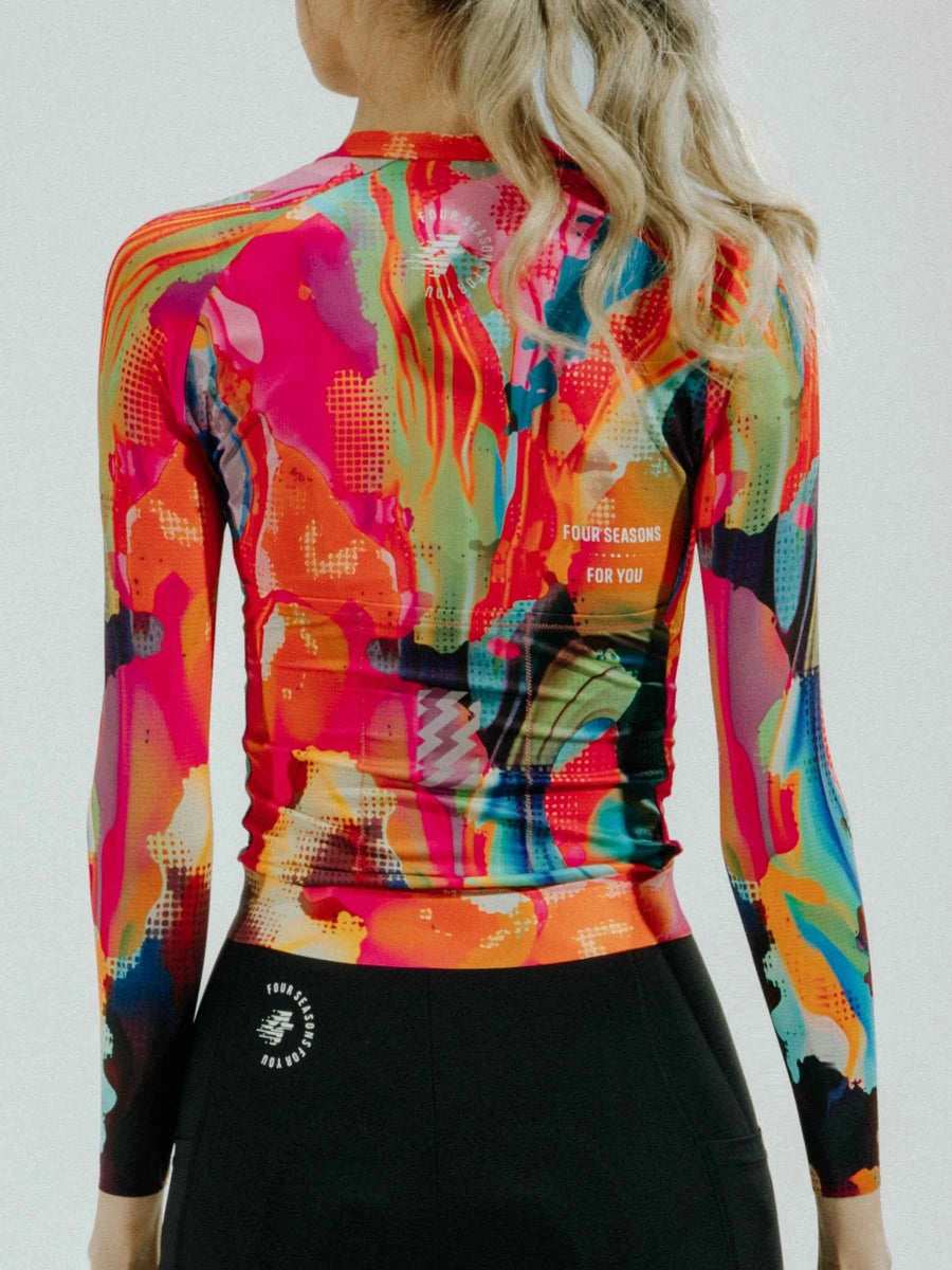 Hue långärmad damcykeltröja i rökig röd med neonfärgad färgstänkdesign tillverkad av toray polyester dränerar svett