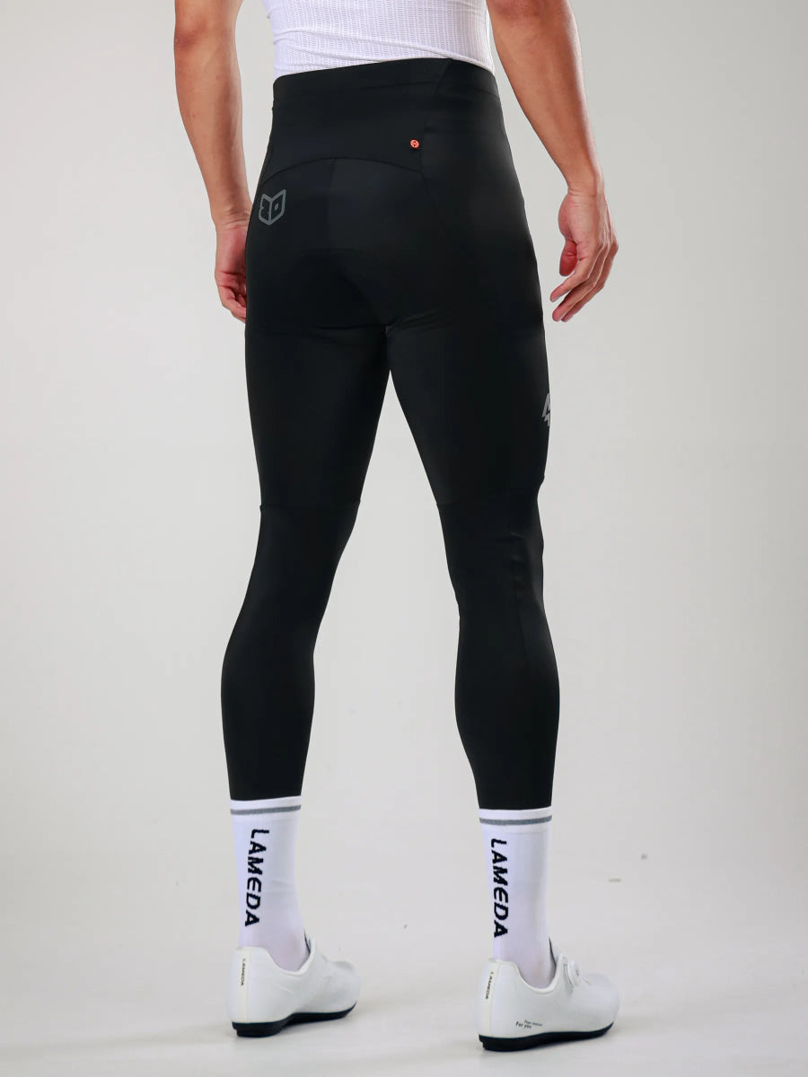 Black Lameda 20th anniv special men’s thermal cycling tights with elastic interface and gray logo on back with white branded socks