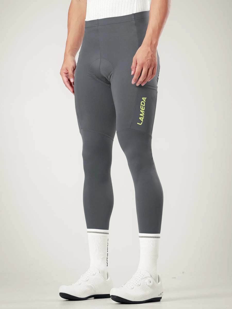 Grå LAMEDA 20-årsjubileums special herr cykeltights med elastisk gränssnittskonstruktion på låren och vit manschettkant