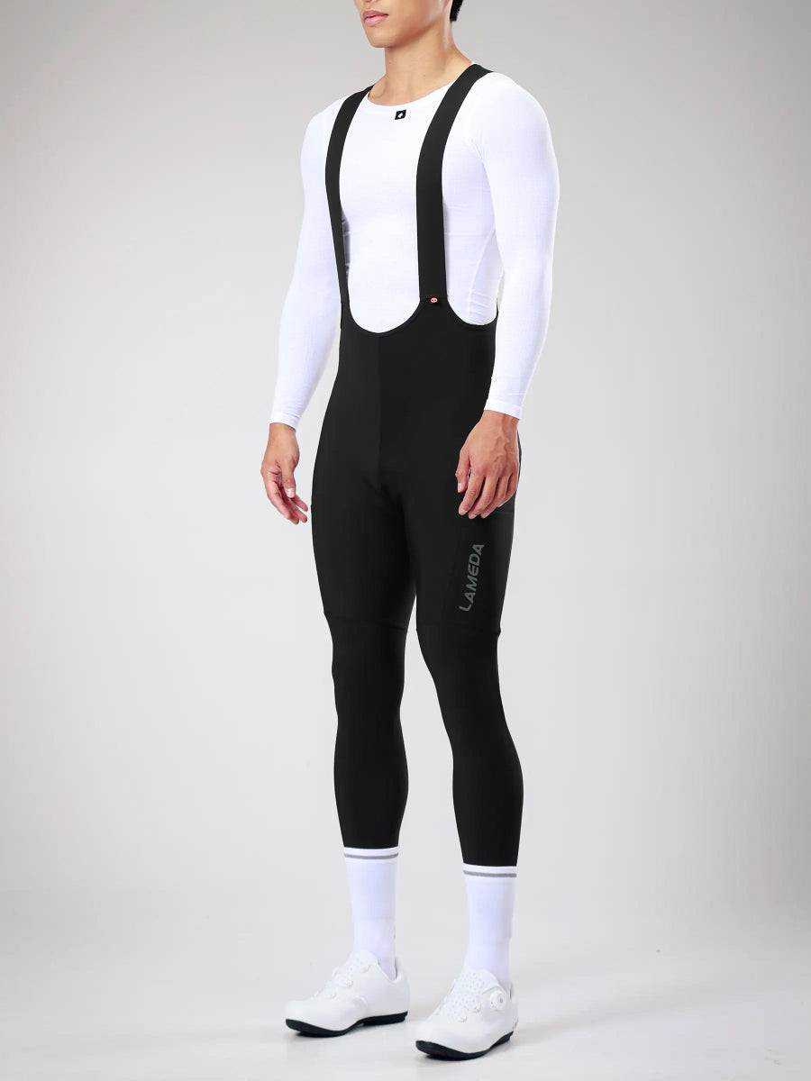 Svart LAMEDA 20th anniv special termiska herr vinter bib tights med vit kant på elastisk fog och diskret bröstlogotyp