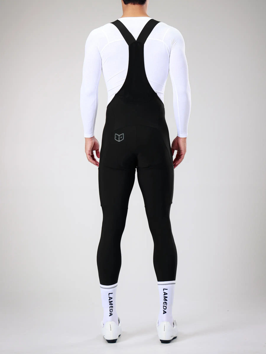 Svart LAMEDA herr vinter bib tights med elastiskt gränssnitt och diskret grå logga på ryggen för värmeisolerad cykling