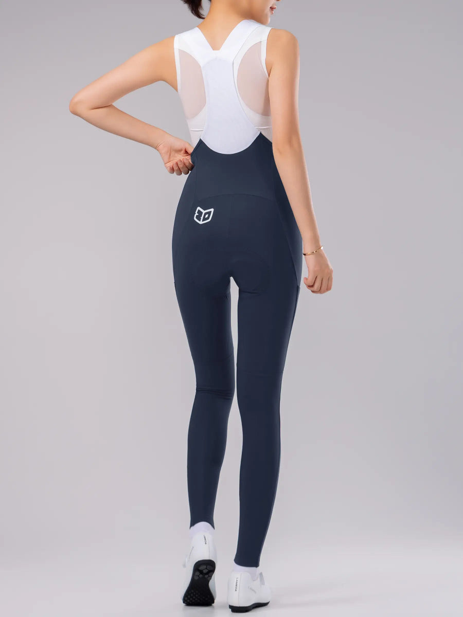 navyblå LAMEDA damernas cykelbib-tights med vit nätbakpanel och elastic interface® för värmekomfort