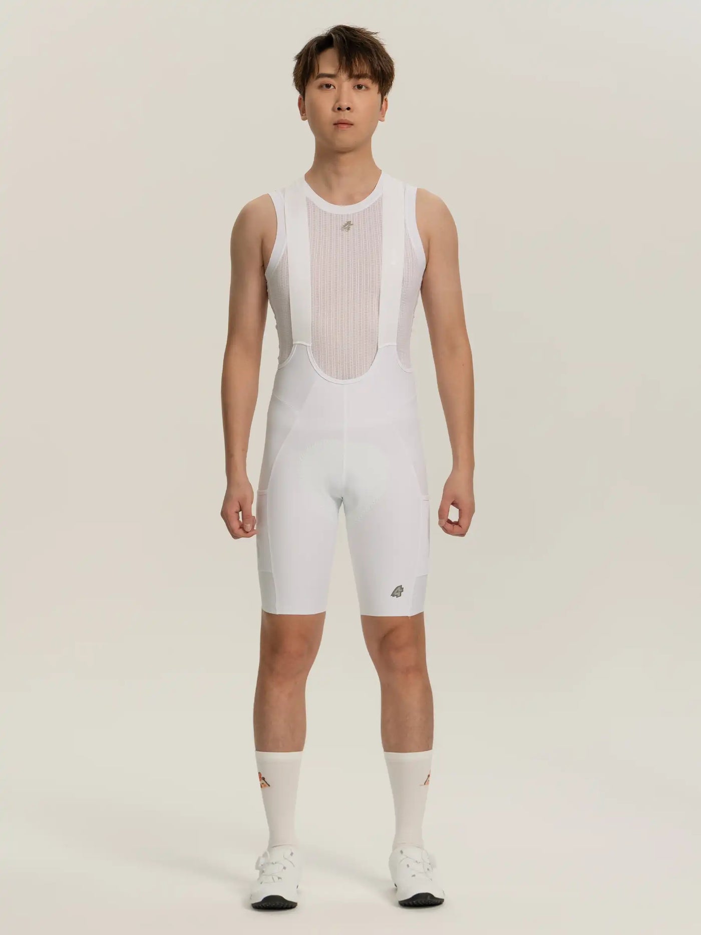 Vit hjärtfjäder herr bibshorts med nätbröstpanel och diskreta varumärkesdetaljer för cykling
