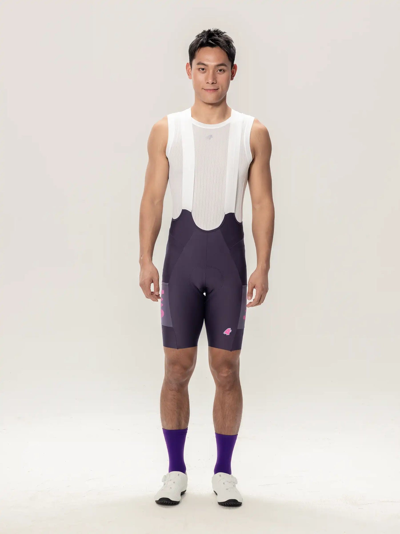 Heart feather herr bibshorts i lila med vit nätöverdel och diskreta rosa accenter på sidorna för cyklingprestanda
