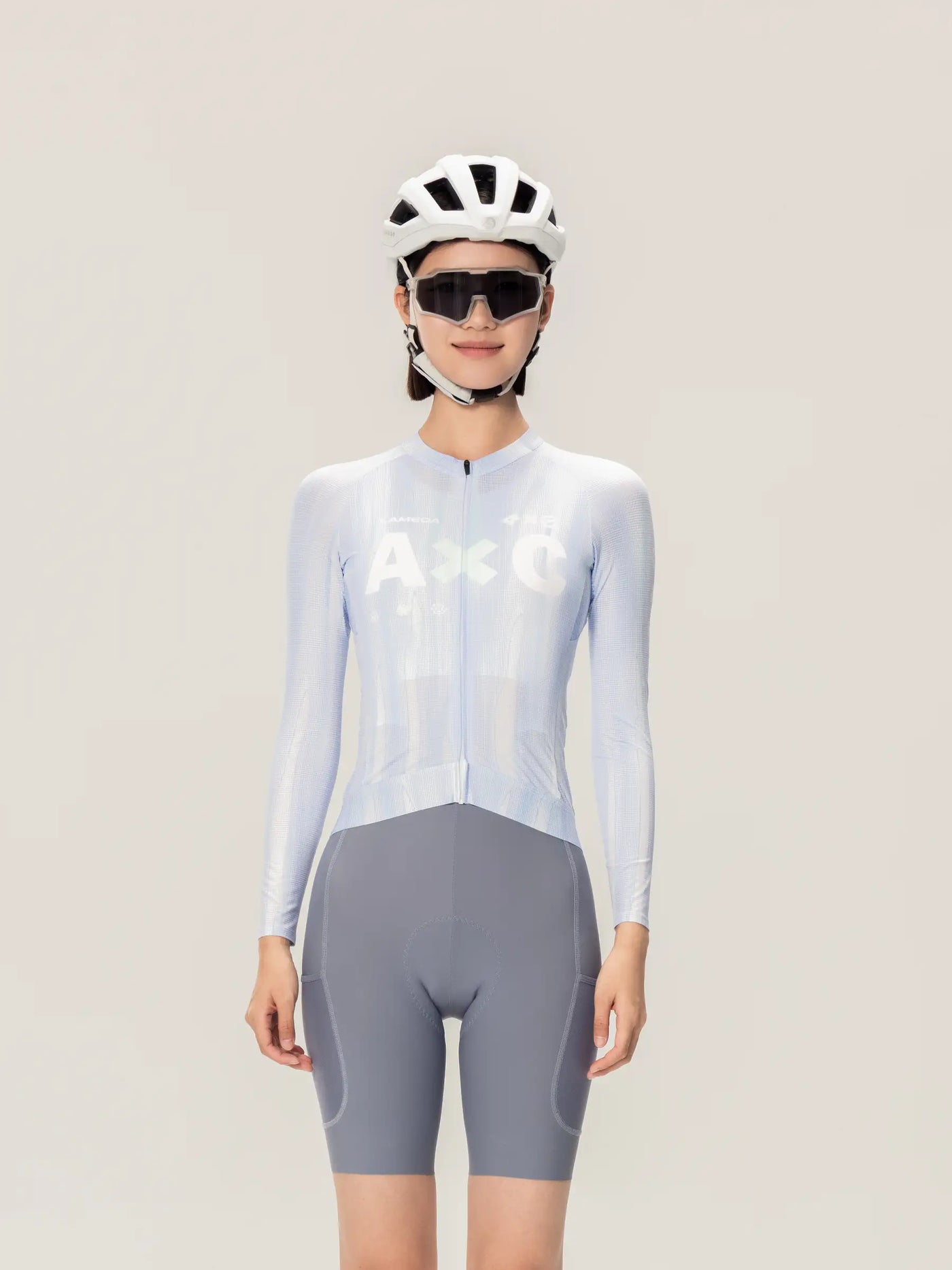 Ljusblå och grå LAMEDA x australian studio unisex cykeltröja ls med vit logotyp på bröstet för mångsidig användning