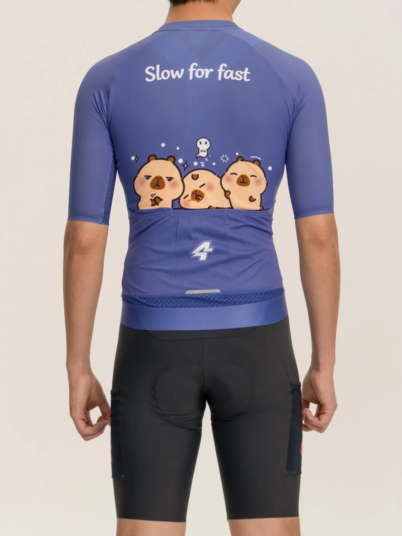 Bakvy av en blå LAMEDA x capybara australian studio unisex cykeltröja med slow for fast capybara grafik