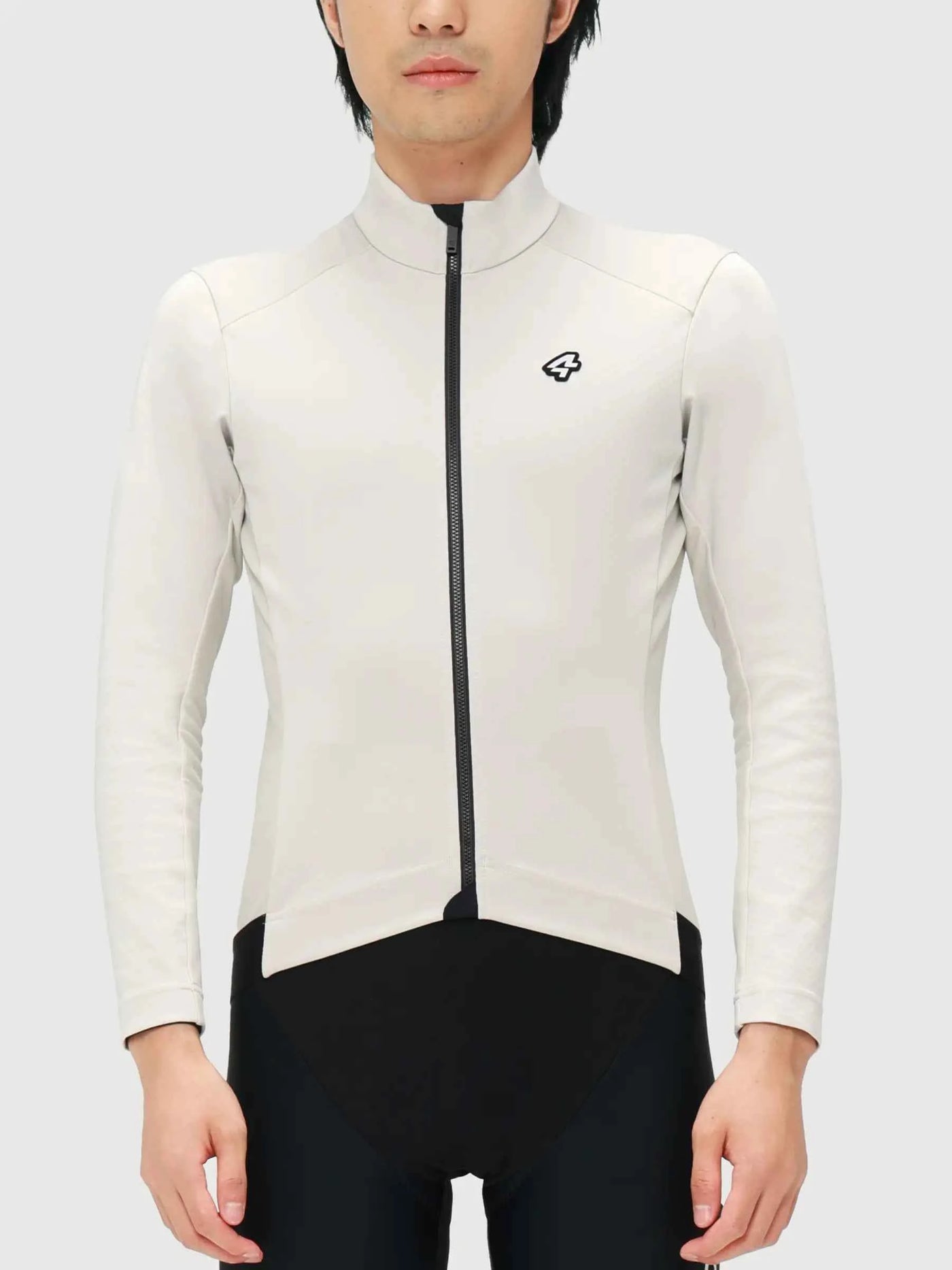 Shield herr beige cykeljacka med benvita långa ärmar svart dragkedja och diskret märkeslogotyp på bröstet