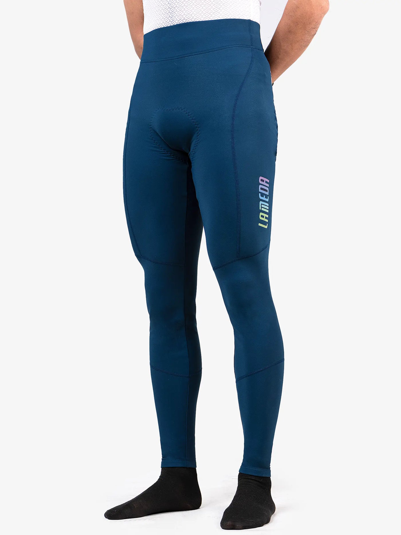 Future men’s thermal tights in deep teal lameca with high waist and subtle rainbow branding for early winter wear