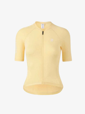 A pale yellow lameda women’s cycling short-sleeved jersey with moisture-wicking fabric and anti-slip hem