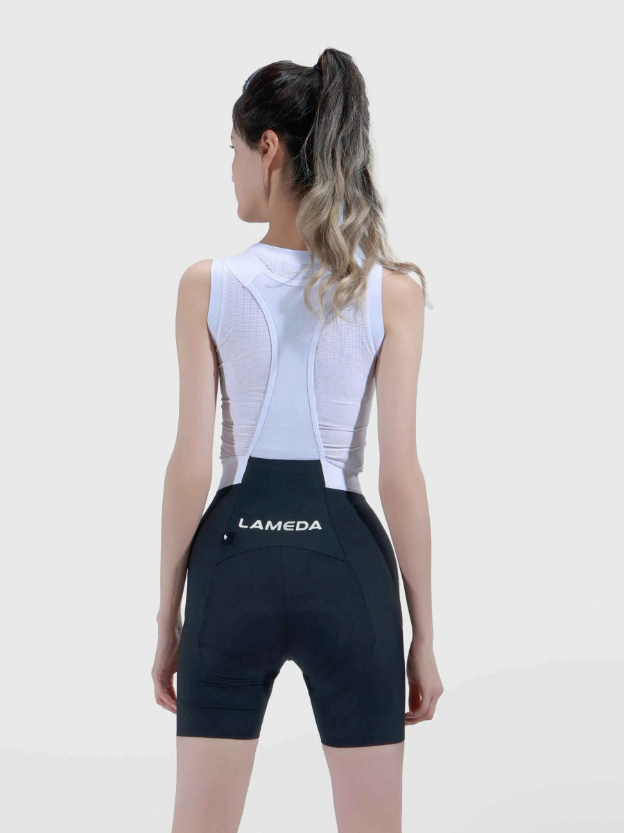 Zwarte LAMEDA luminance fietsbroek met bretellen voor vrouwen met achterzak en strak aansluitend ontwerp voor prestatiegebruik