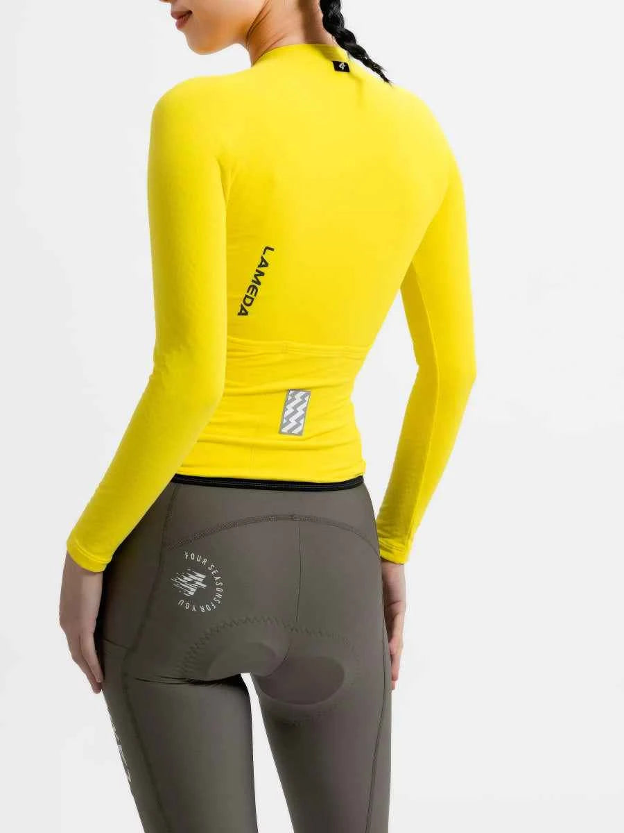 Ljusgul LAMEDA polar night dams fleecefodrad termocykeltröja baksida med svart kant och reflekterande lapp