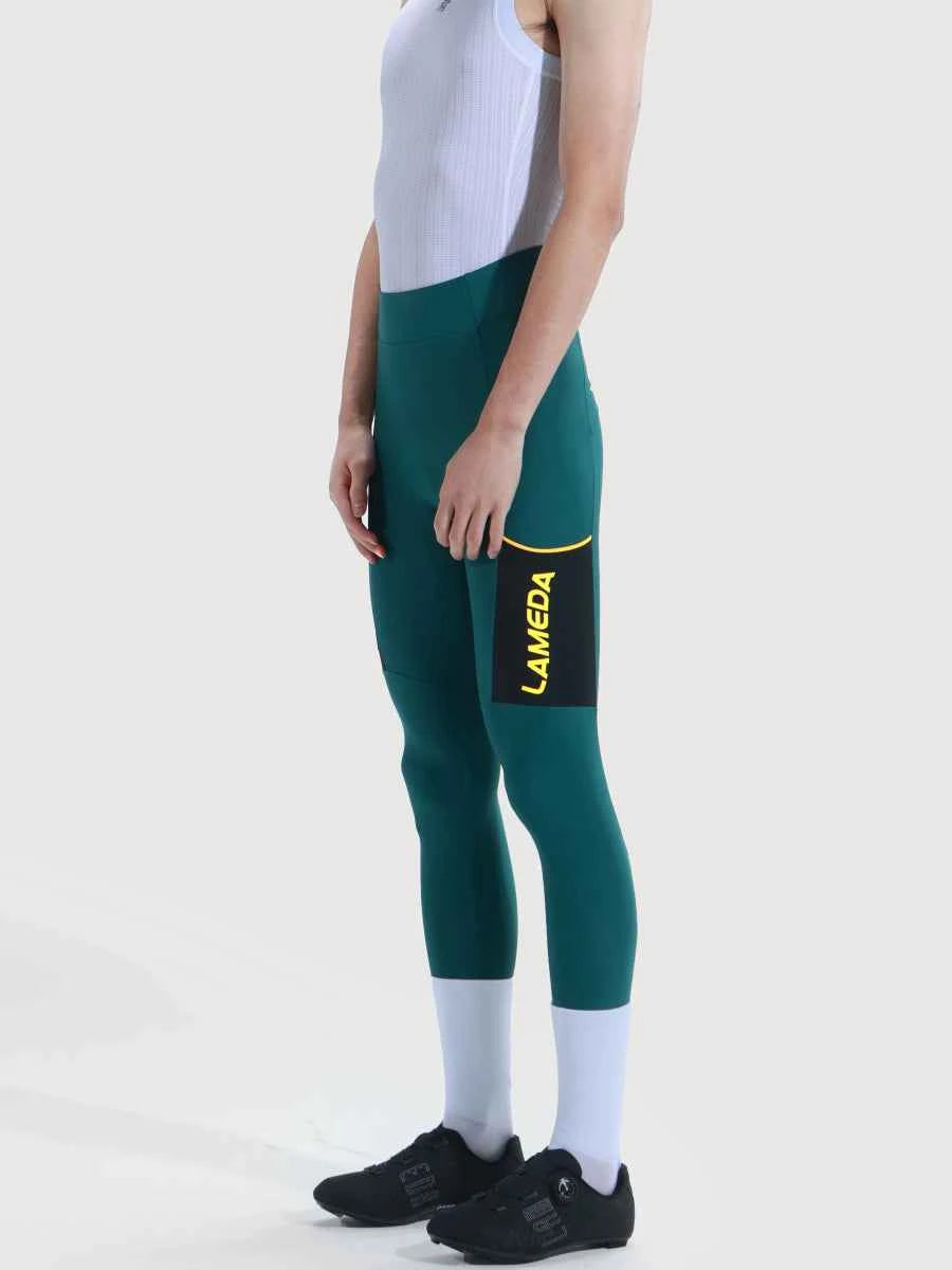 Serenity men cycling pants turquoise with teal lameda serenity men’s tights featuring a black and yellow lameda logo patch on thigh