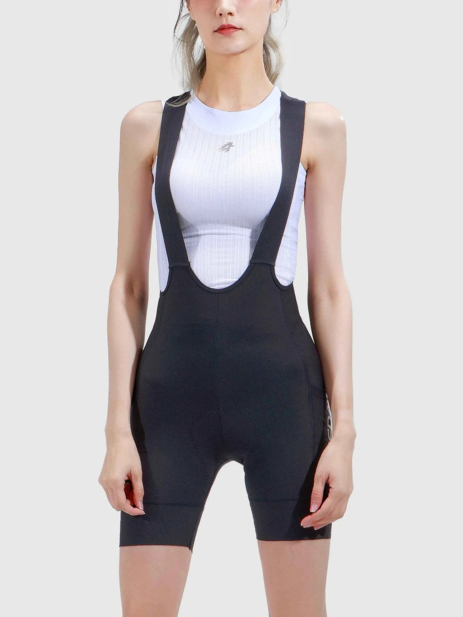 Svarta LAMEDA soothe damcykelbibshorts med vit kompressionstopp och smidig formpassande design för cykling