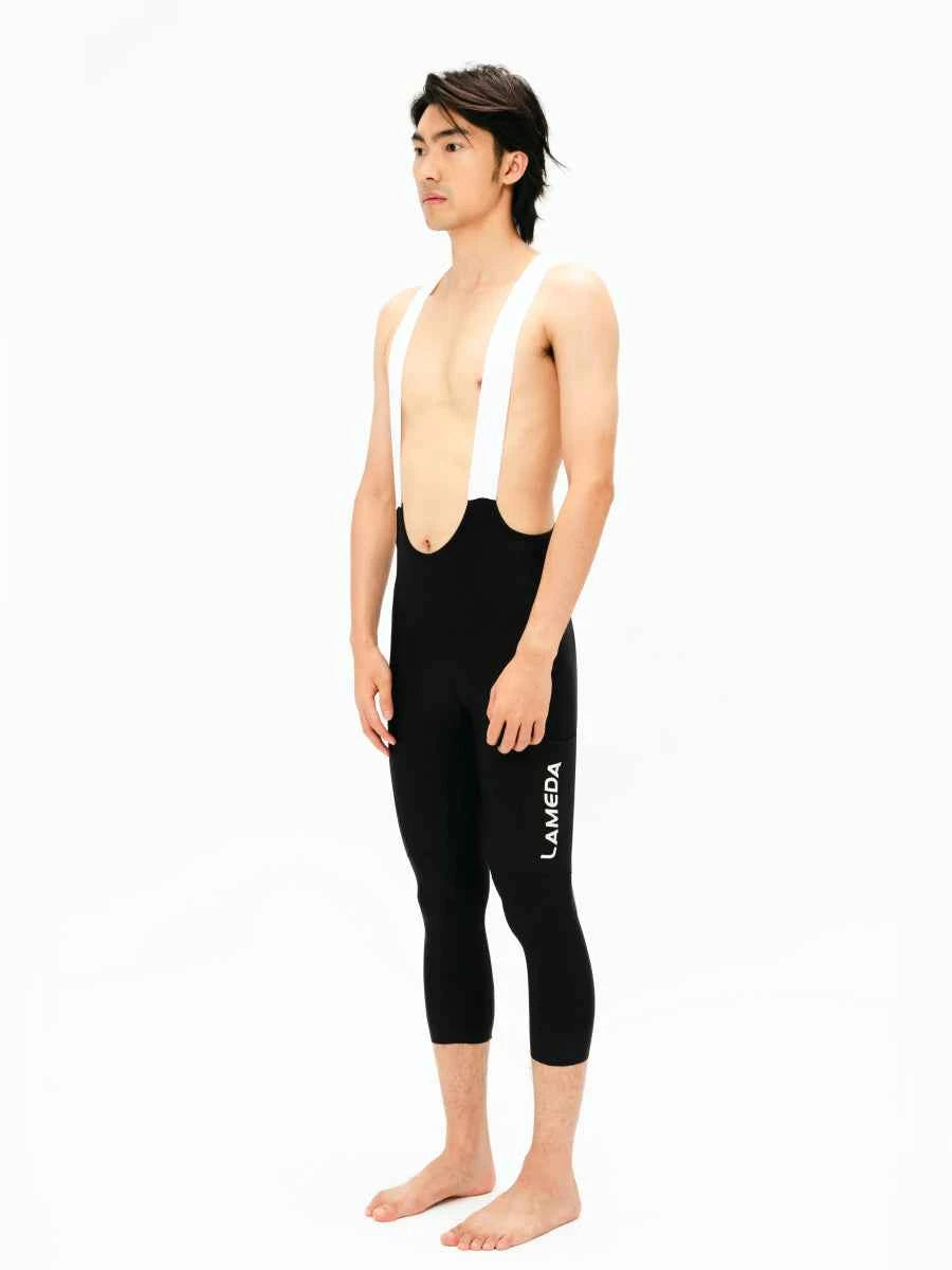 Black lameda summit men’s cycling bib pants 3/4 capris with white suspenders designed for cycling performance