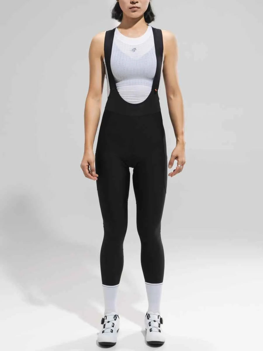 Kvinnors elite bib tights 2025ssxx521 i svart har vit kant, subtil bröstlogotyp och andrahudspassform för kvinnlig kroppsform