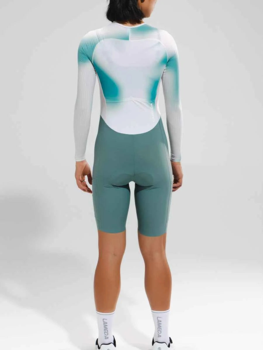 Damernas pro cykelskinsuit 2024sss5228 med långa ärmar i vit och teal gradient och enhetlig salviagrön nedre del