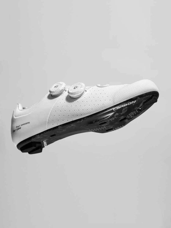 White yik carbon fiber cycling cleat shoe with carbon fiber sole and three circular buckles for lameda yik cycling use