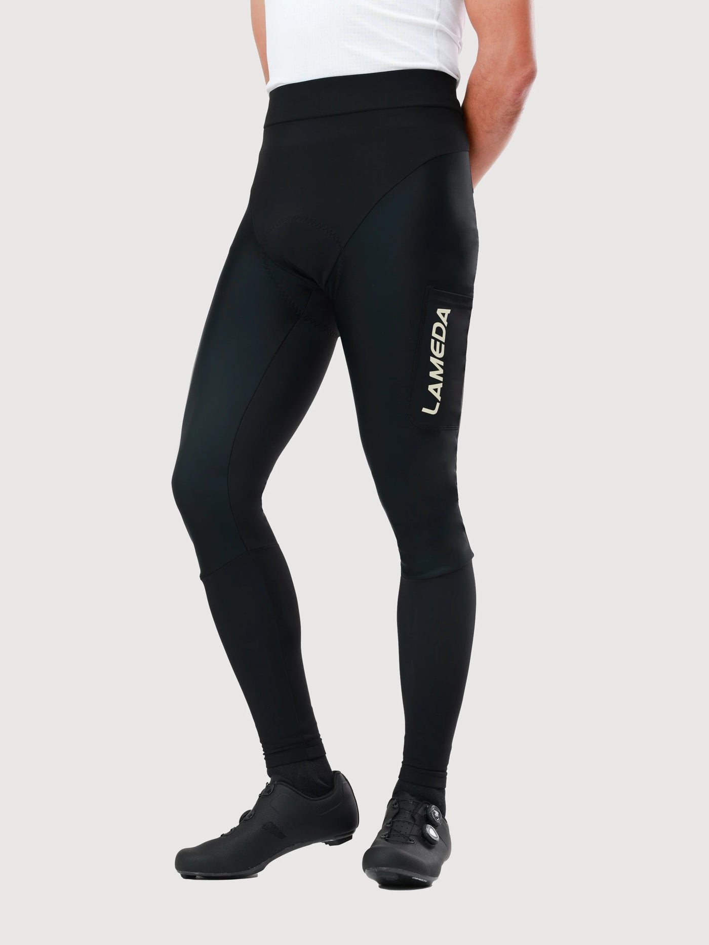 Elite thermal men’s tights s458 black cycling tights feature a sleek design with breathable compression and windproof panels